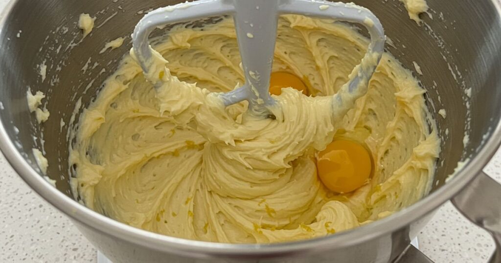 Mixing Lemon Zest and Eggs into Batter