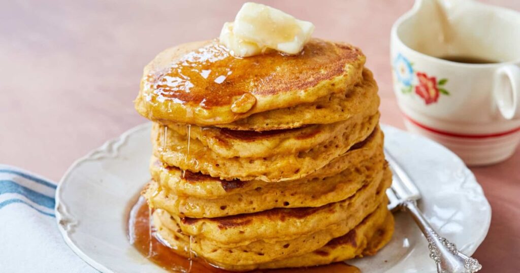 A tall stack of pumpkin Greek yogurt pancakes