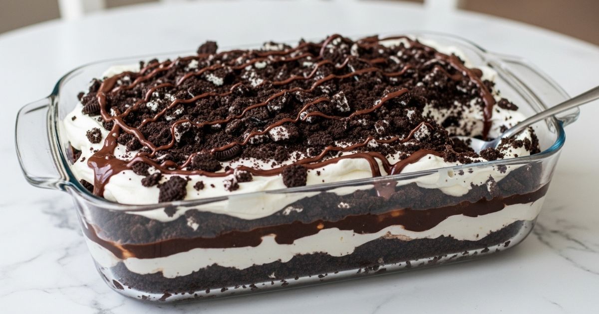 Finished Oreo dirt cake decorated with Oreo crumbs