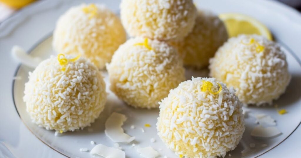 Lemon Snowball Cookies Stacked on a plate