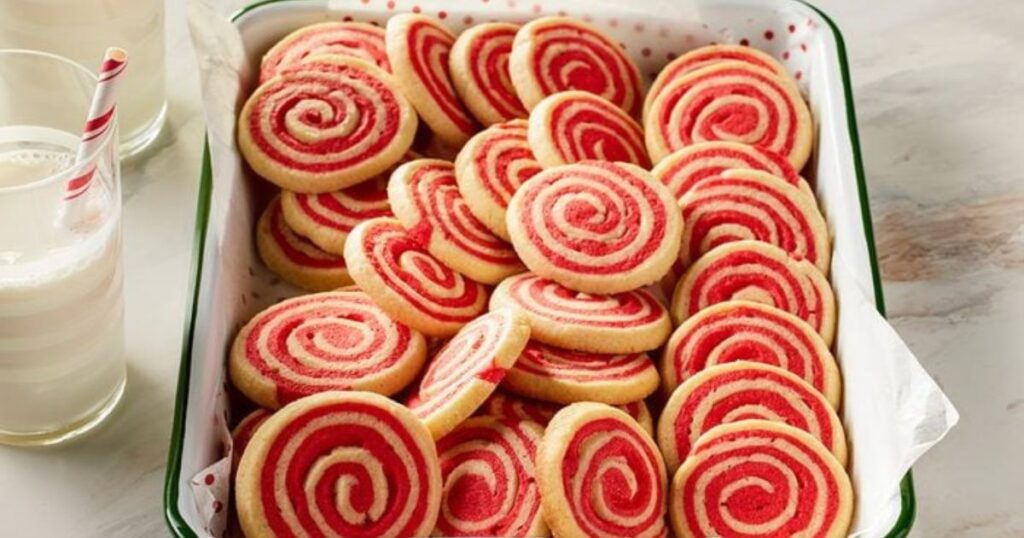 Peppermint swirl cookies stacked on a plate