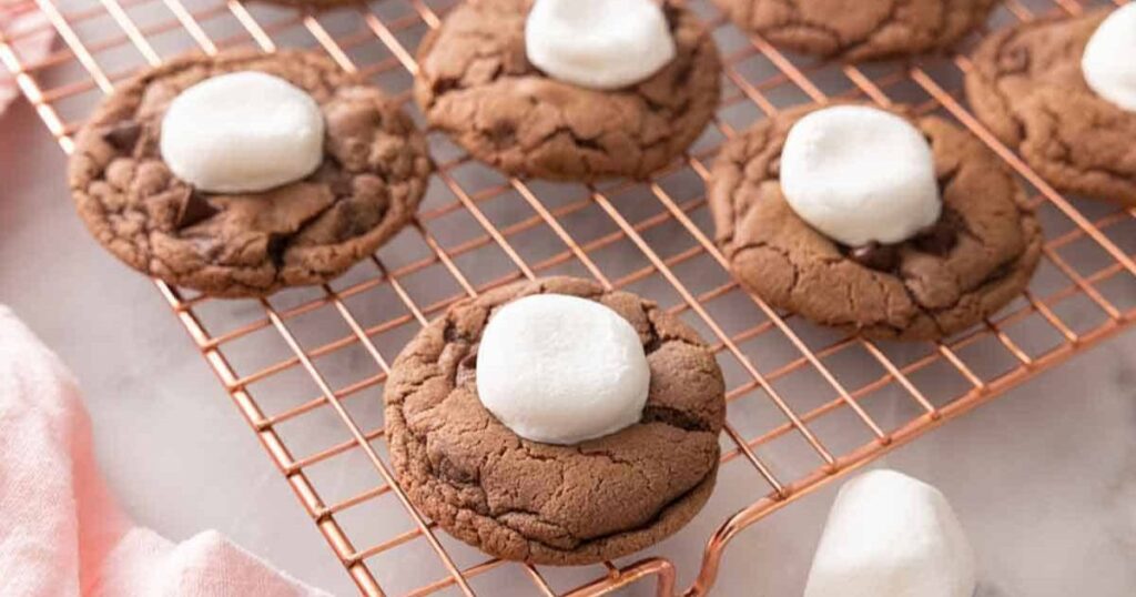 Wrapping cookie dough around marshmallow filling